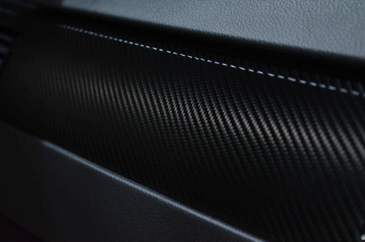 A felt-edged applicator card used on vinyl film